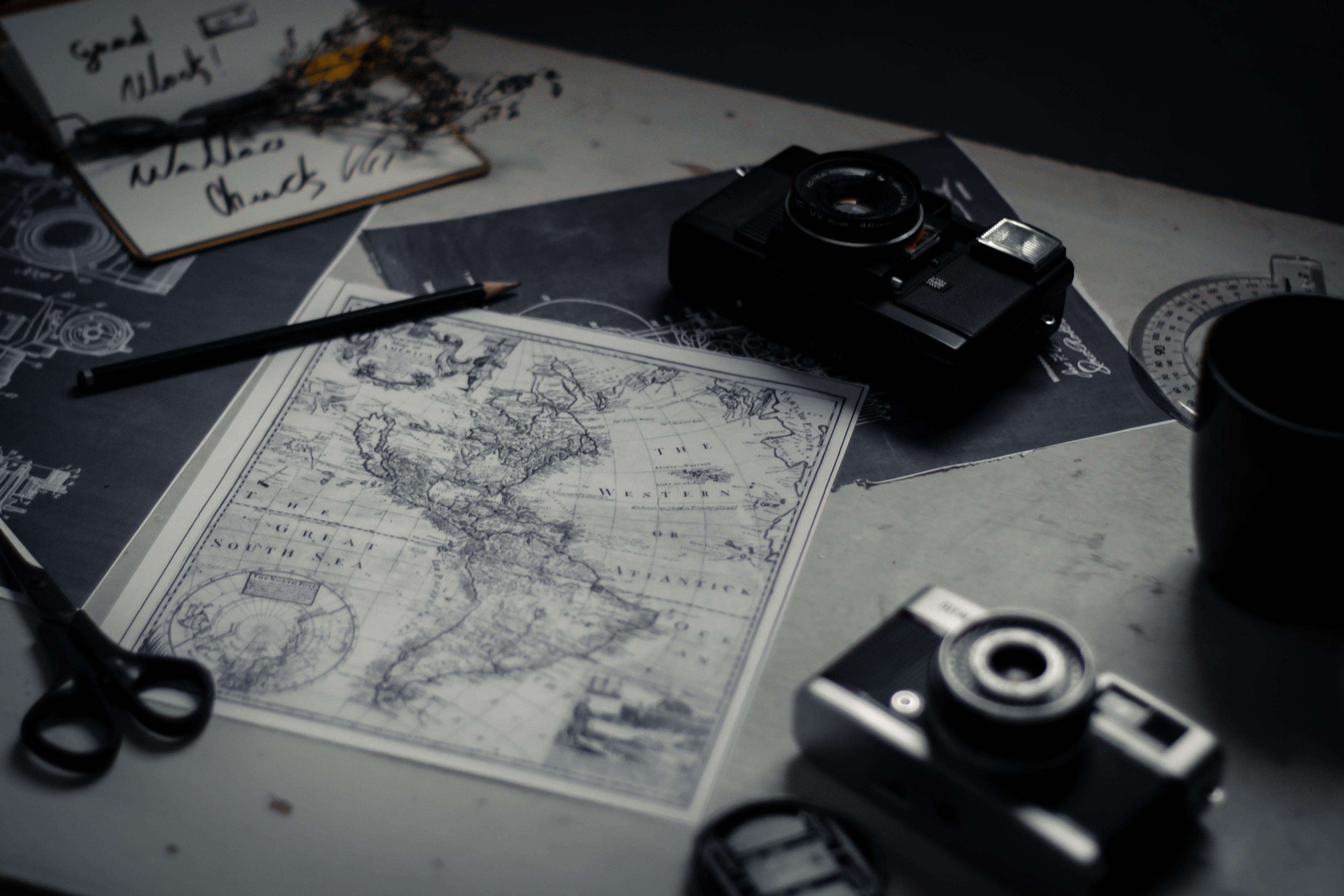 Map and travel accessories on a table